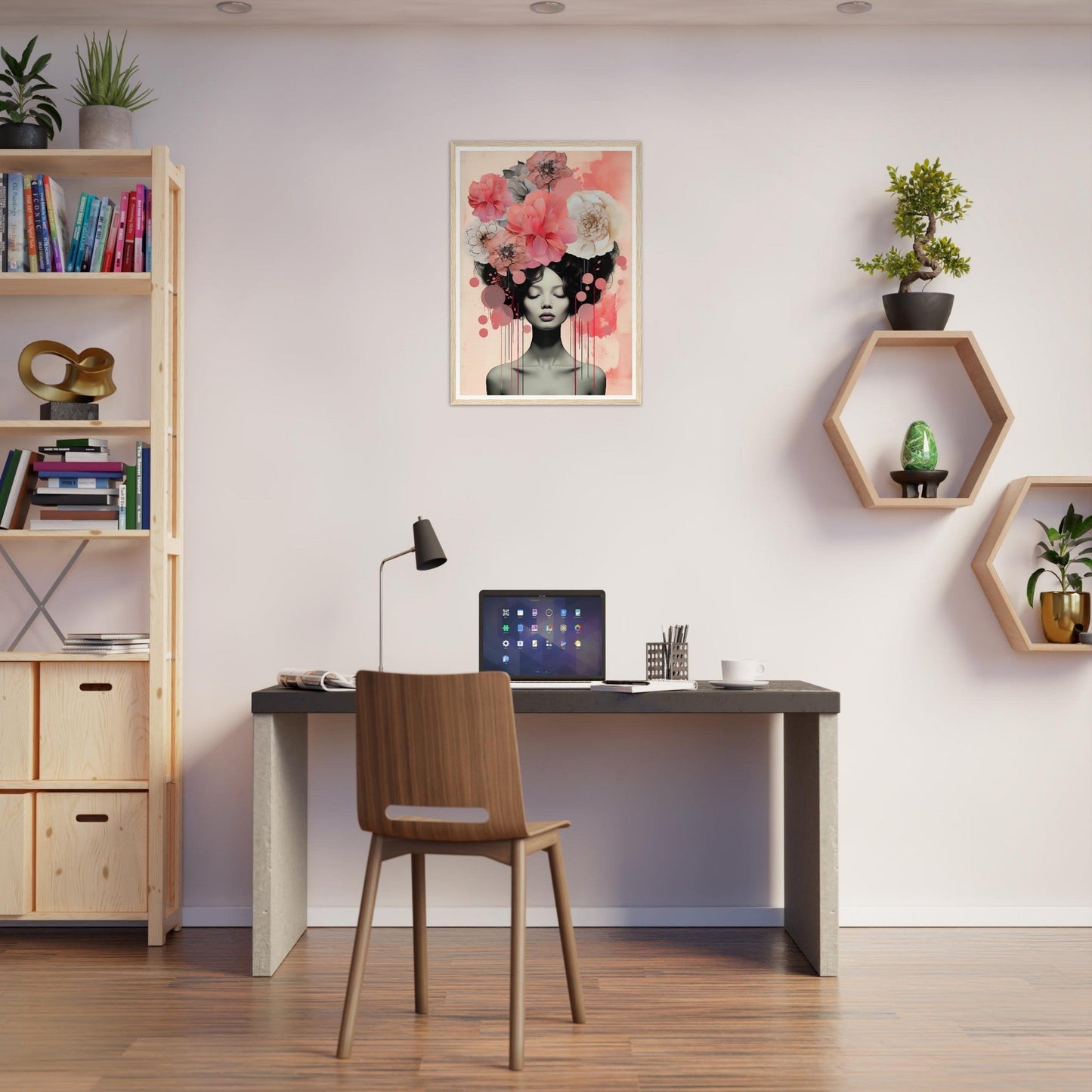 A desk with a laptop and a plant on it