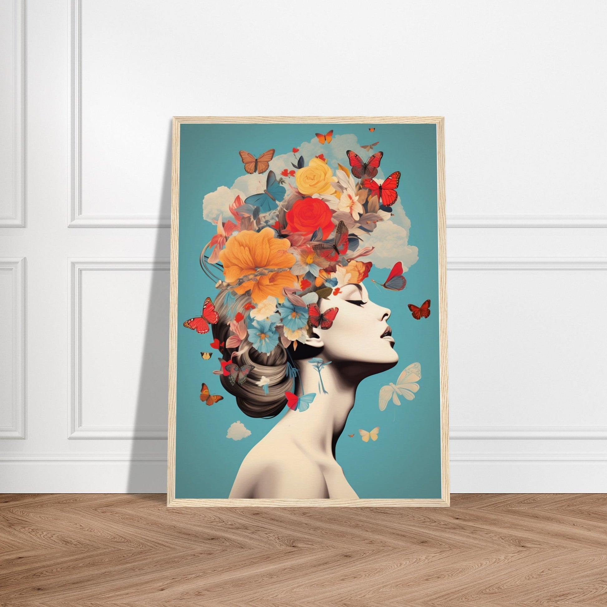 Framed artistic print depicting a woman’s profile with a surreal floral and butterfly headdress.