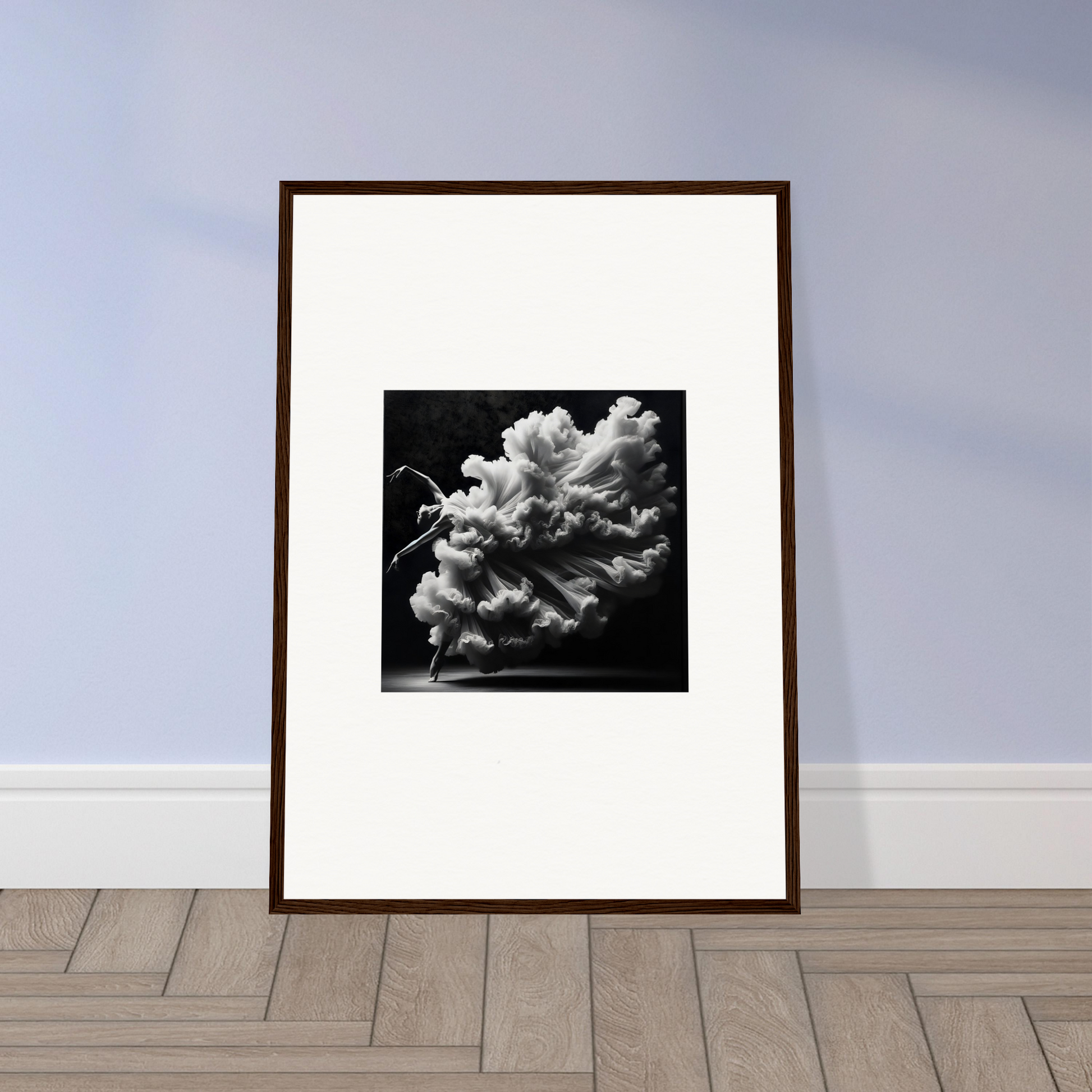 Framed black and white photograph of a dramatic cloud formation.