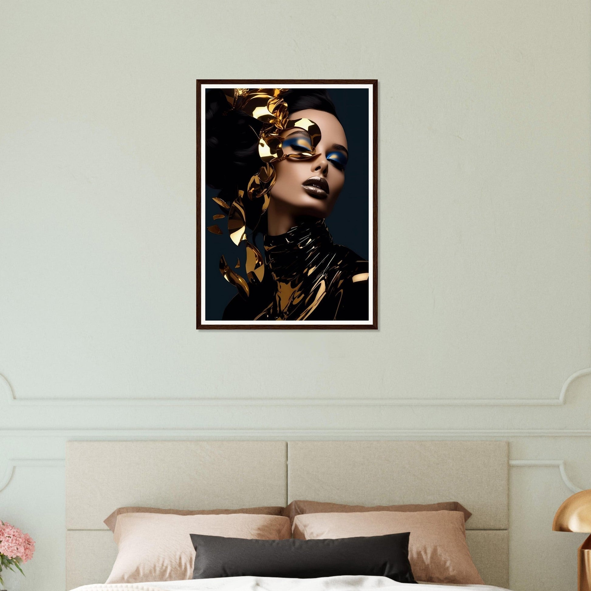 Framed portrait of a woman with gold leaf accents and dramatic makeup.