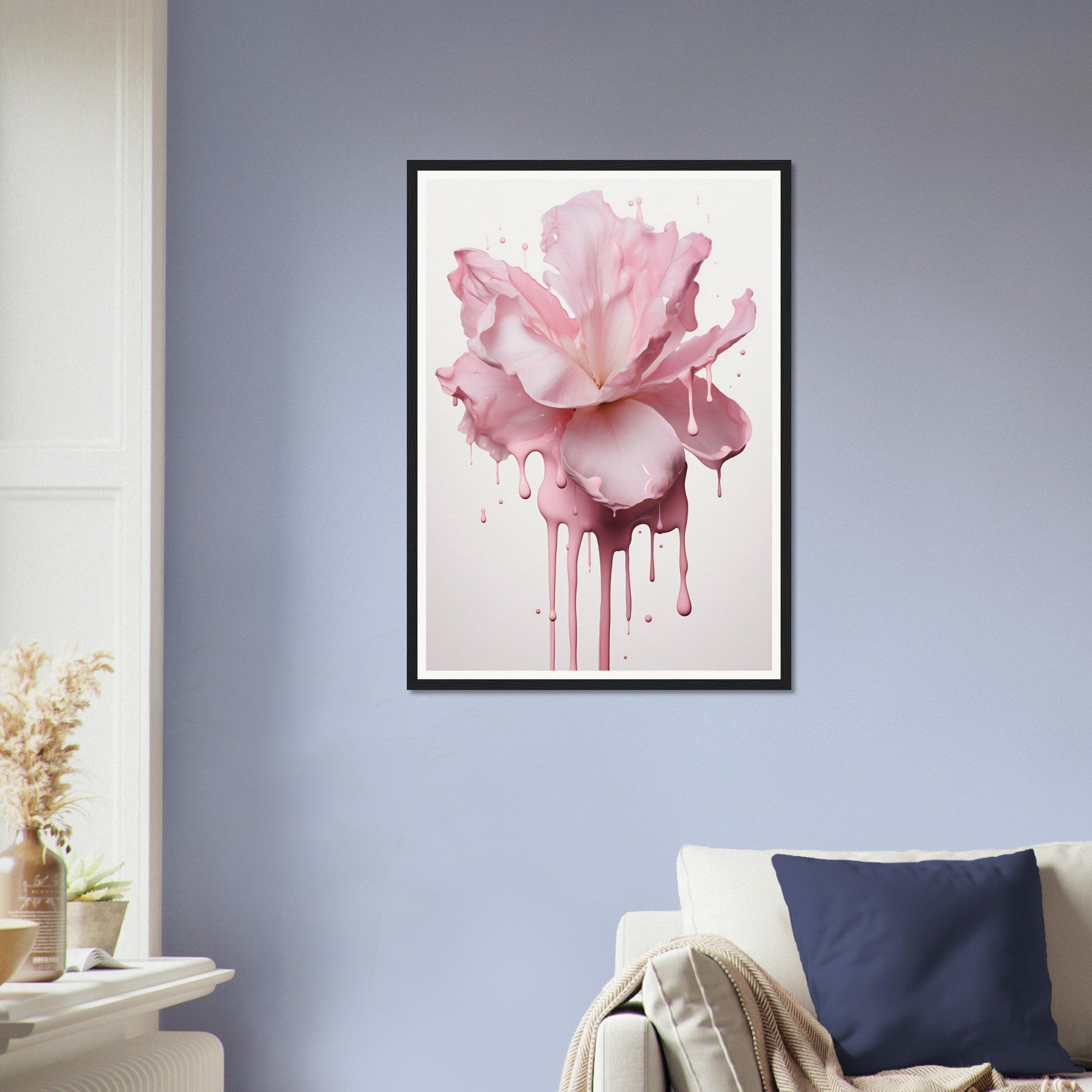 Framed artwork of a pink rose with dripping paint effect.