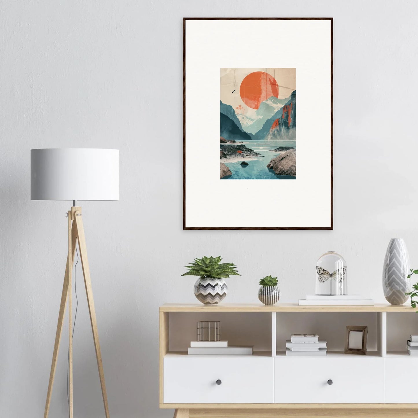 Framed wall art of mountains and water with a red sun for stunning room decor, Sun Echoes