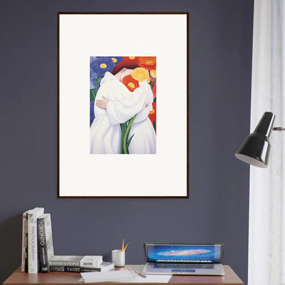 Framed wall art of embracing figures on a colorful background for stylish room decor