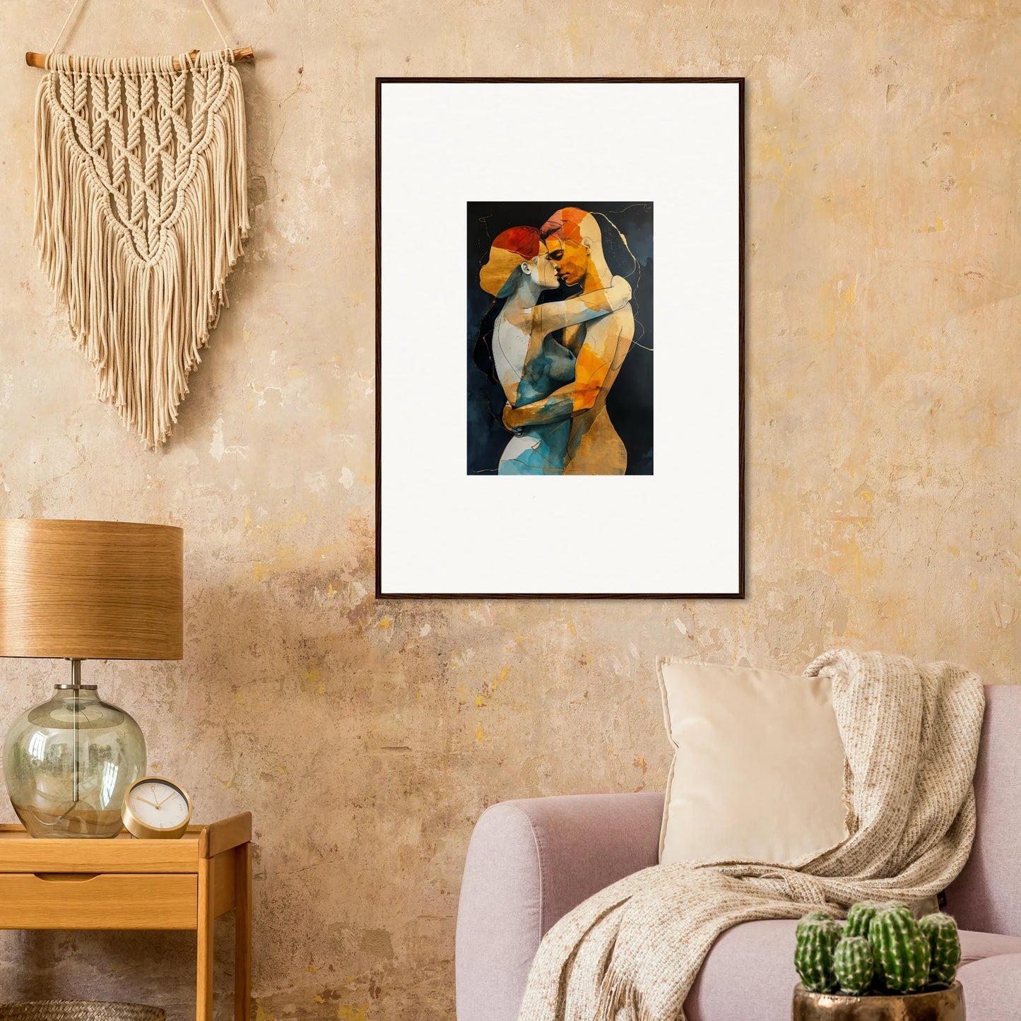 Framed wall art of intertwined figures in vibrant colors for modern room decor