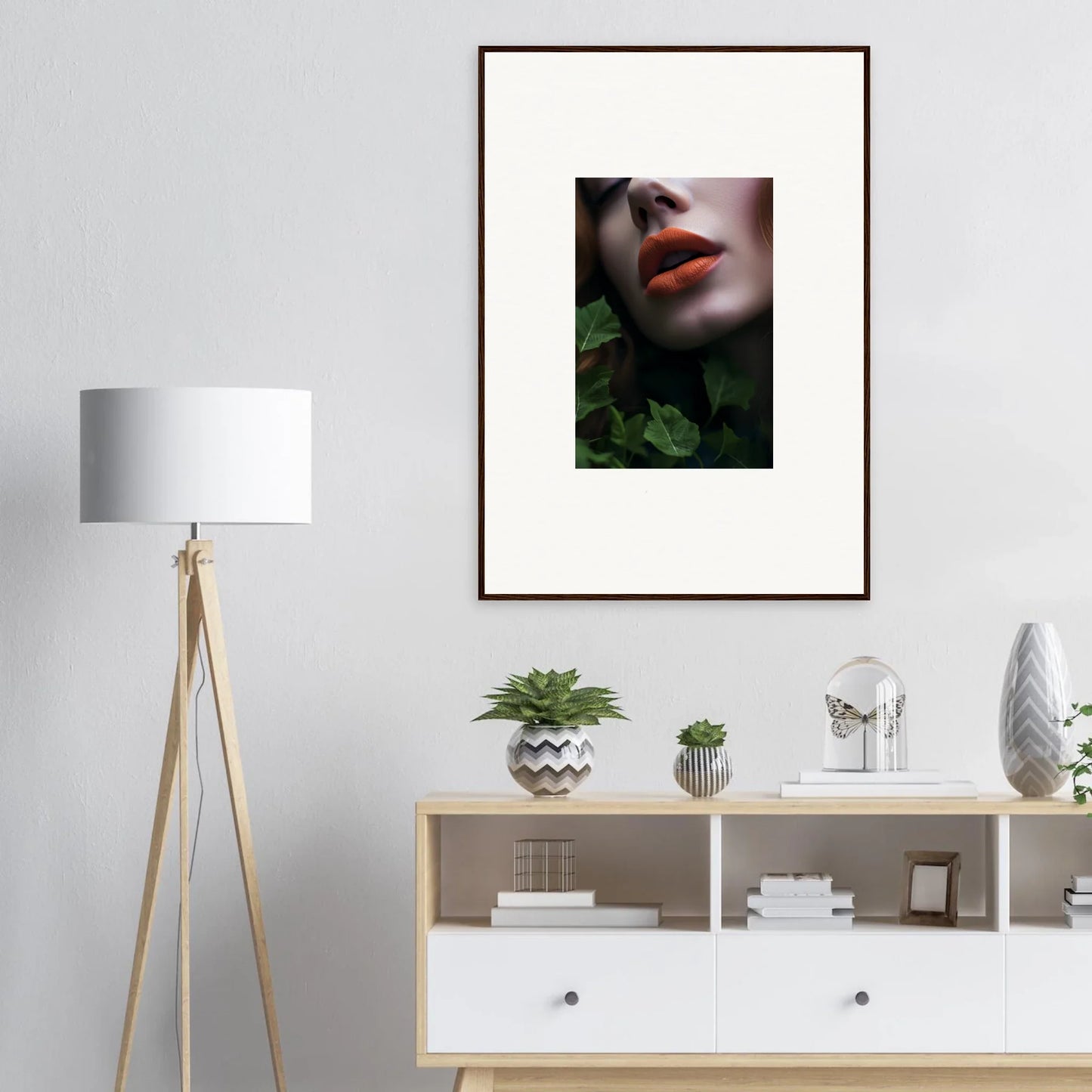 Framed wall art featuring red lips and green foliage for vibrant room decor