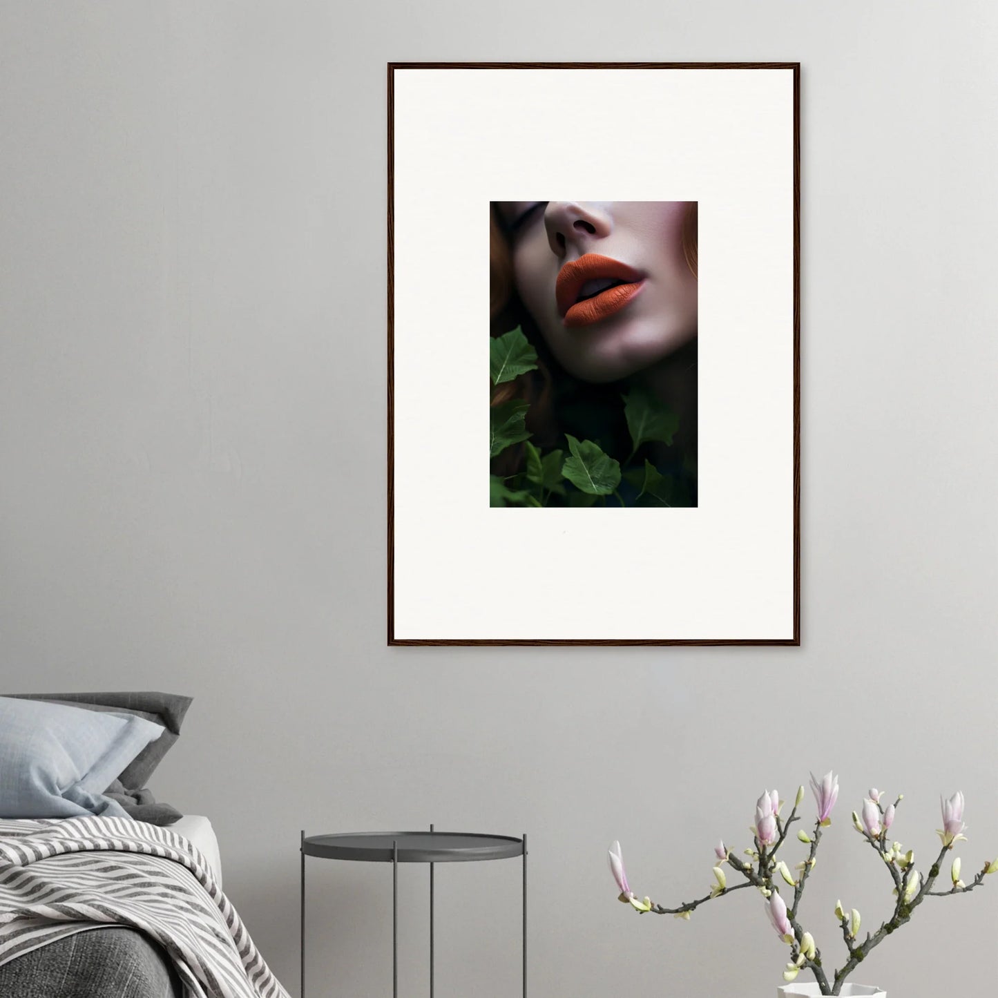 Framed wall art featuring vibrant red lips among lush green foliage for stylish room decor