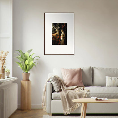 Framed artwork depicting a classical or mythological scene hanging on a wall.