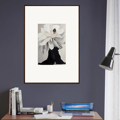 Framed wall art of a figure in a black dress with a white flower for stylish room decor