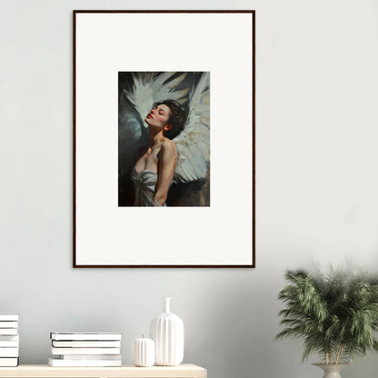 Framed wall art of a figure with feathered elegance and dramatic white wings