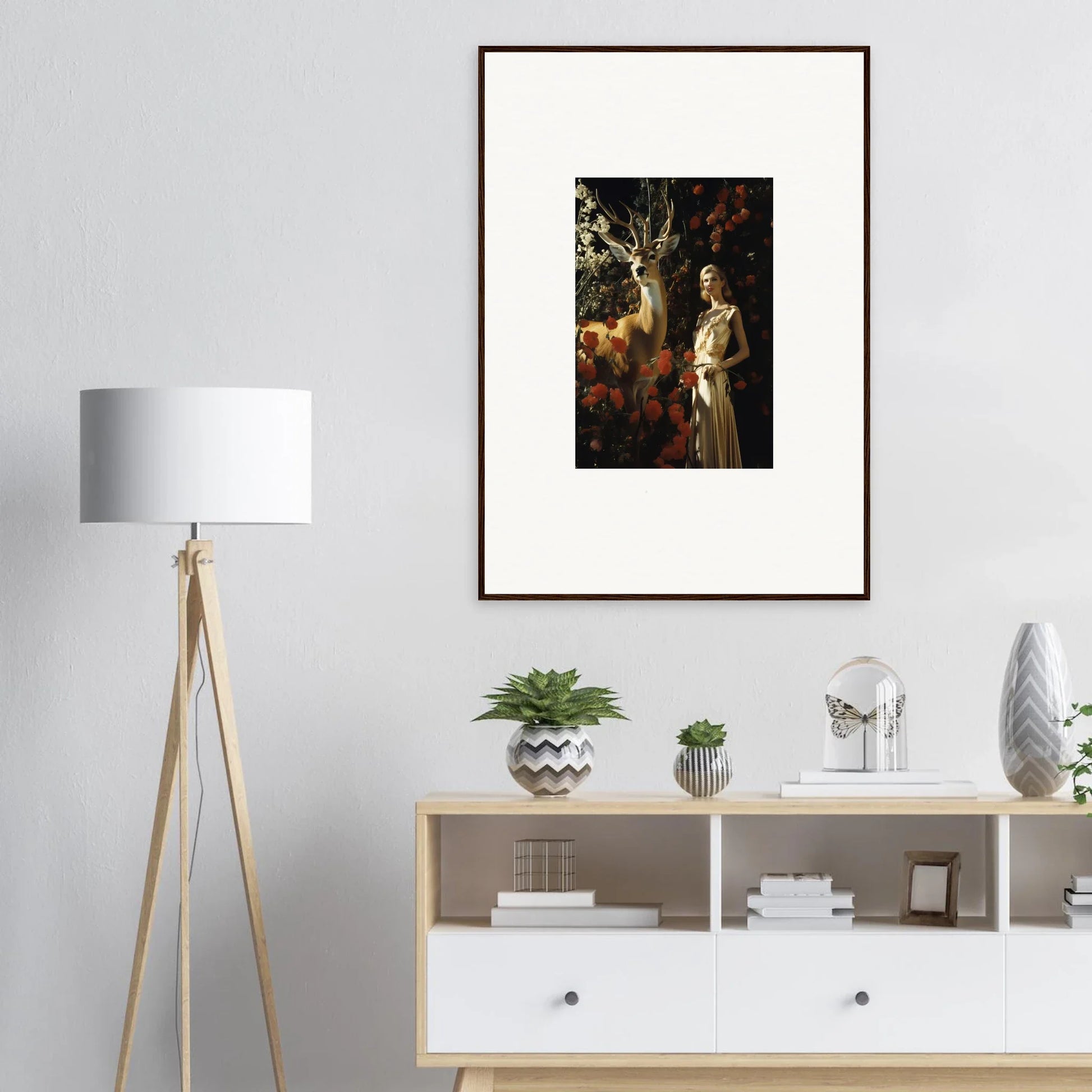 Framed artwork depicting a figure in a forest-like setting.