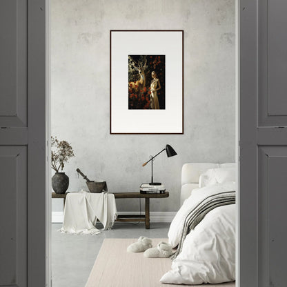 Framed artwork depicting a figure in a forest setting.