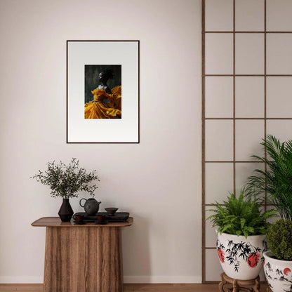 Framed wall art of a figure in a golden robe for sunlit whispers room decor