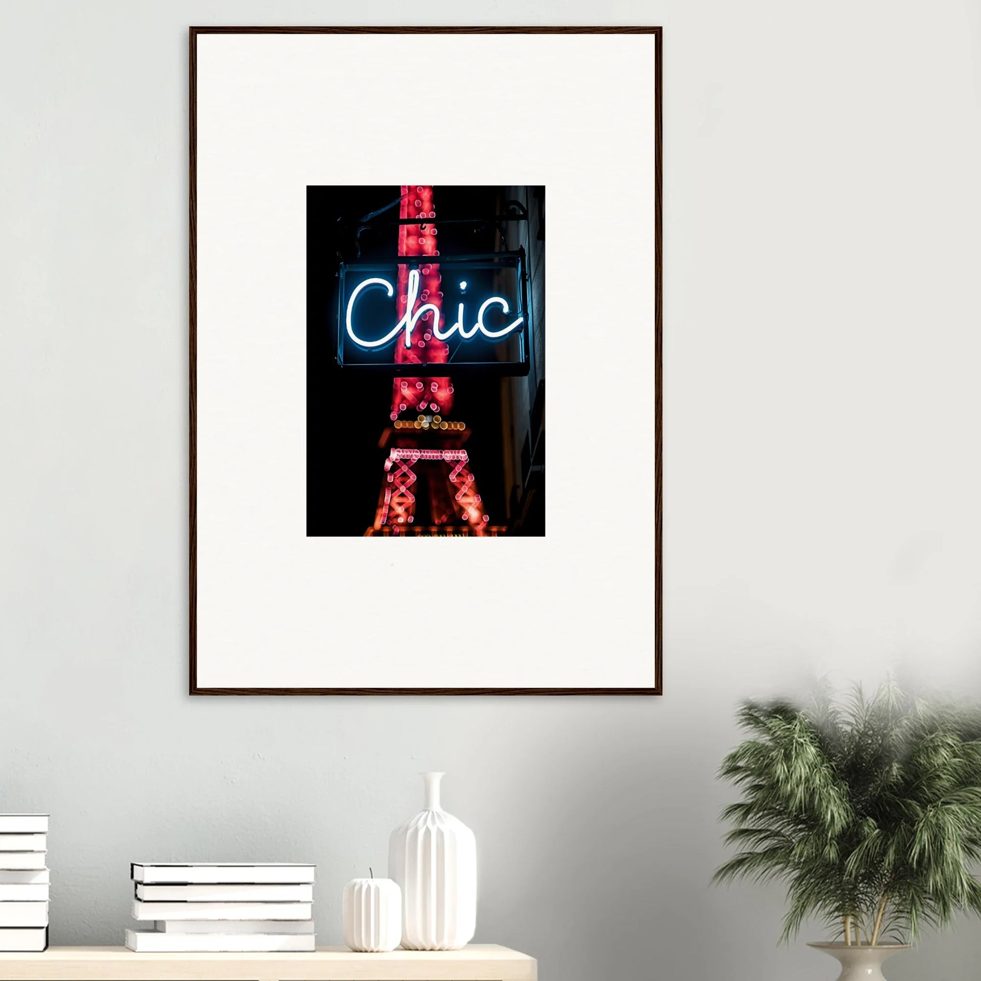 Framed wall art of a neon Chic sign over a red Eiffel Tower for Paris dreams room decor