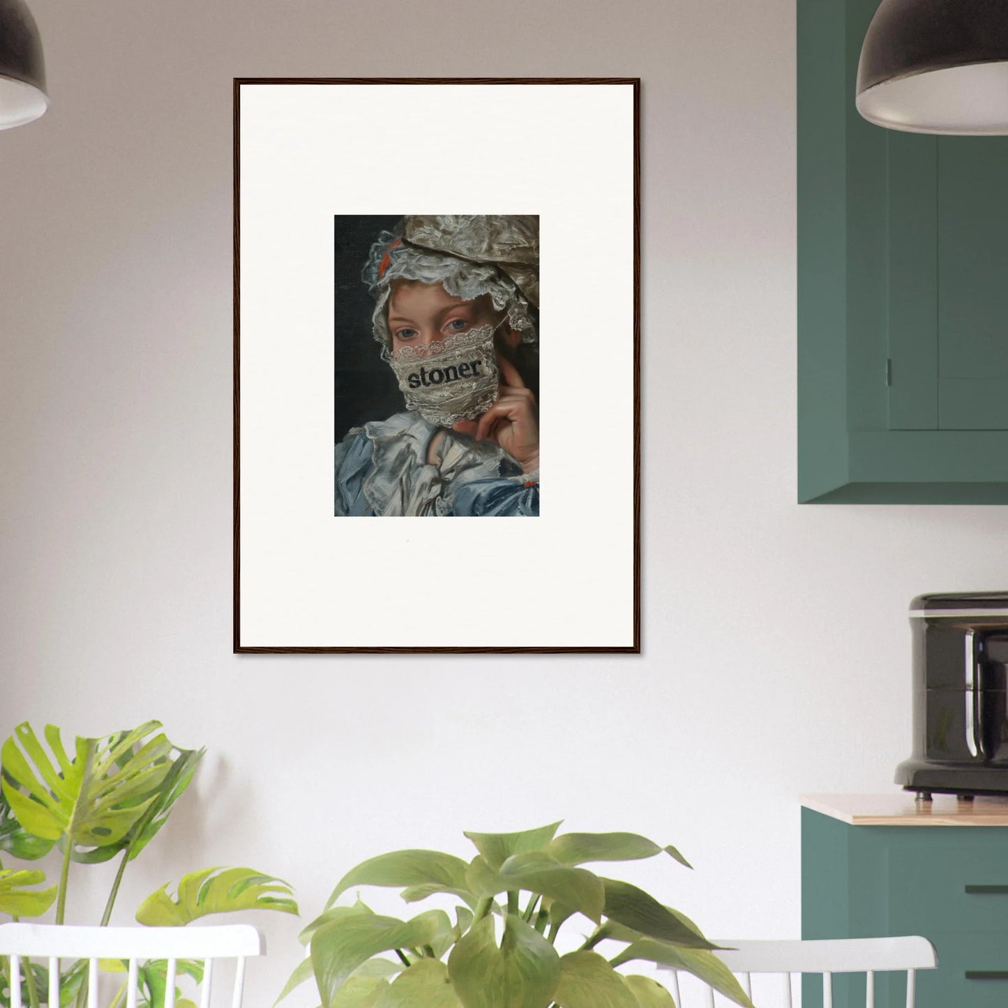 Framed wall art of a person in camouflage with George on their face for Metamorphose Bliss room decor