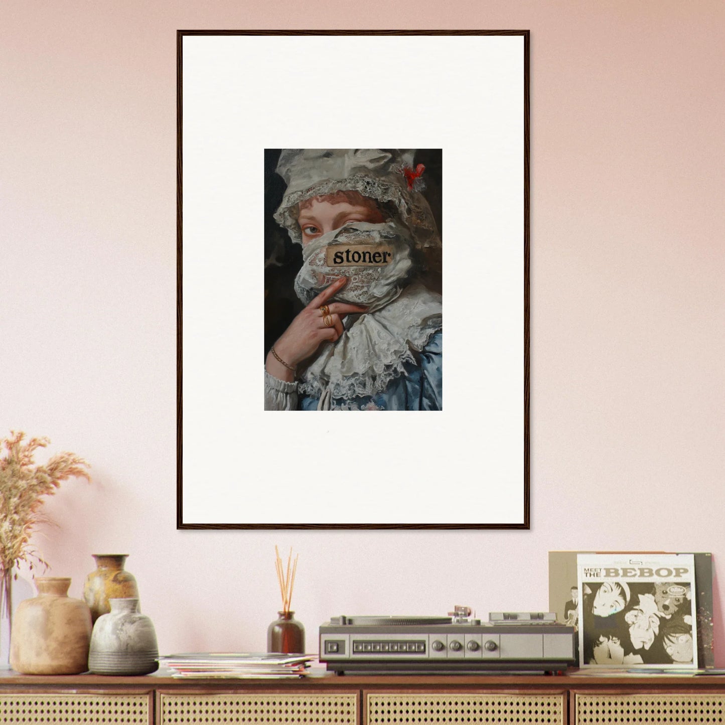 Framed wall art of a marvel muse with a face partially obscured by text for room decor