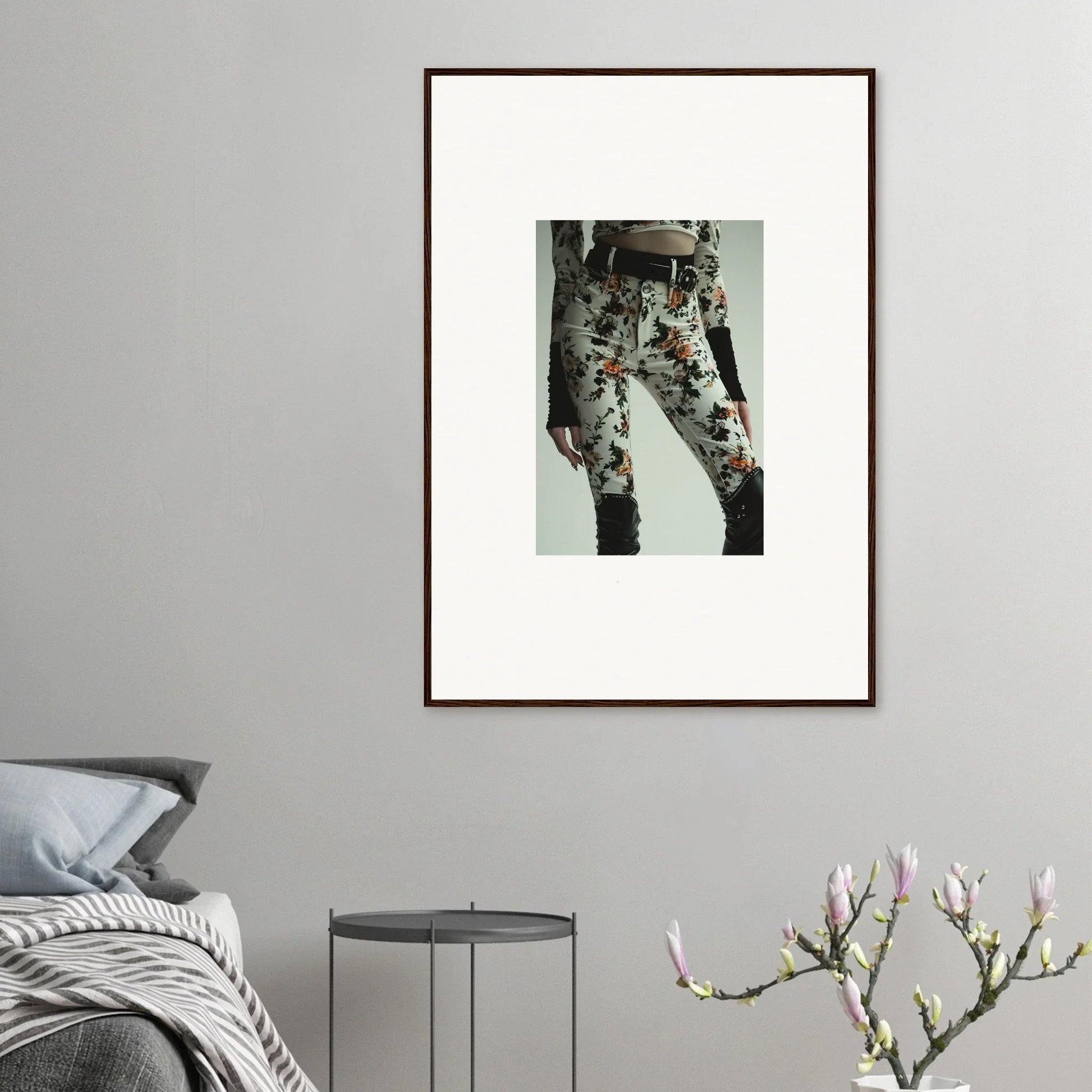 Framed wall art of person in floral pants, perfect for garden couture room decor