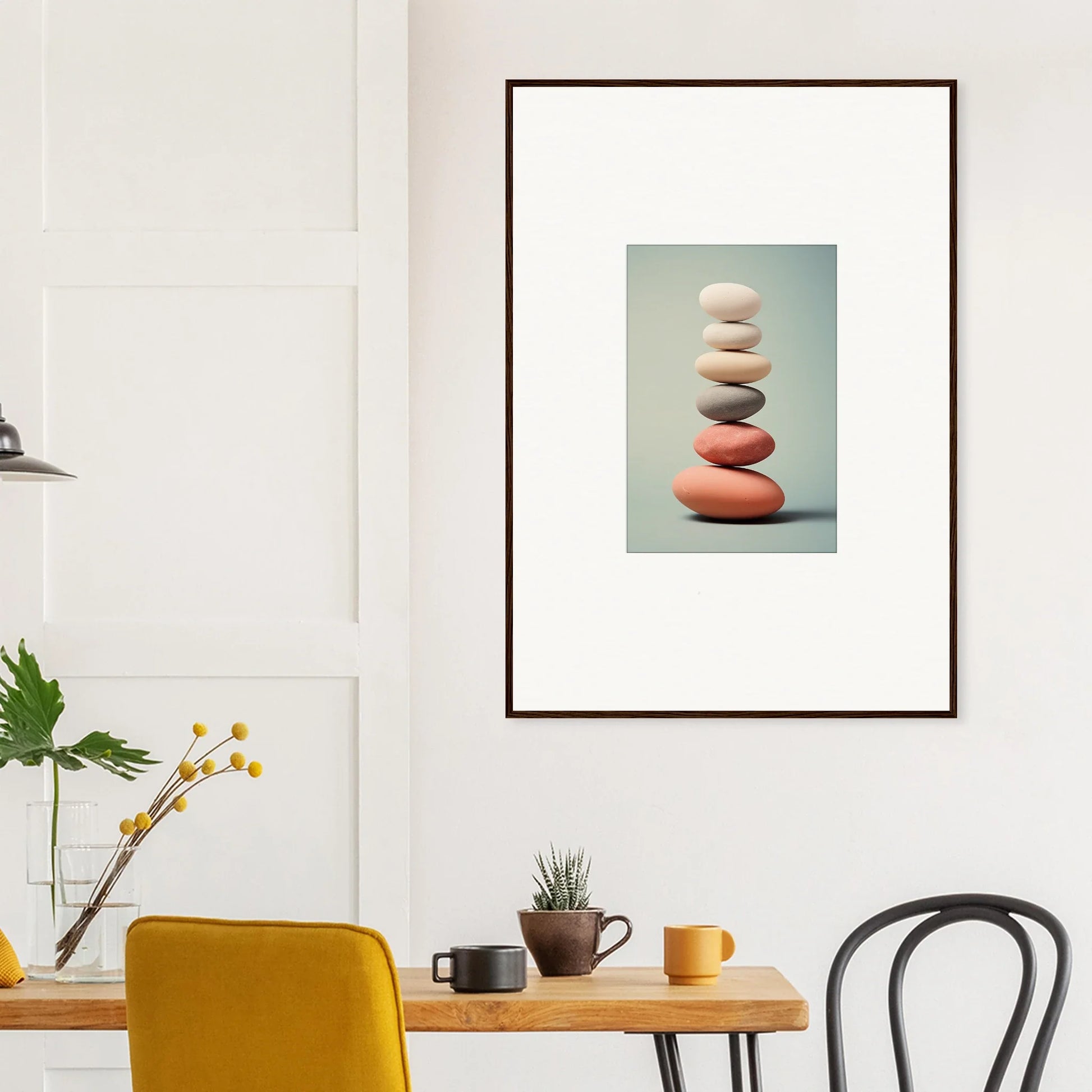 Framed wall art of balanced white and coral stones for stylish room decor