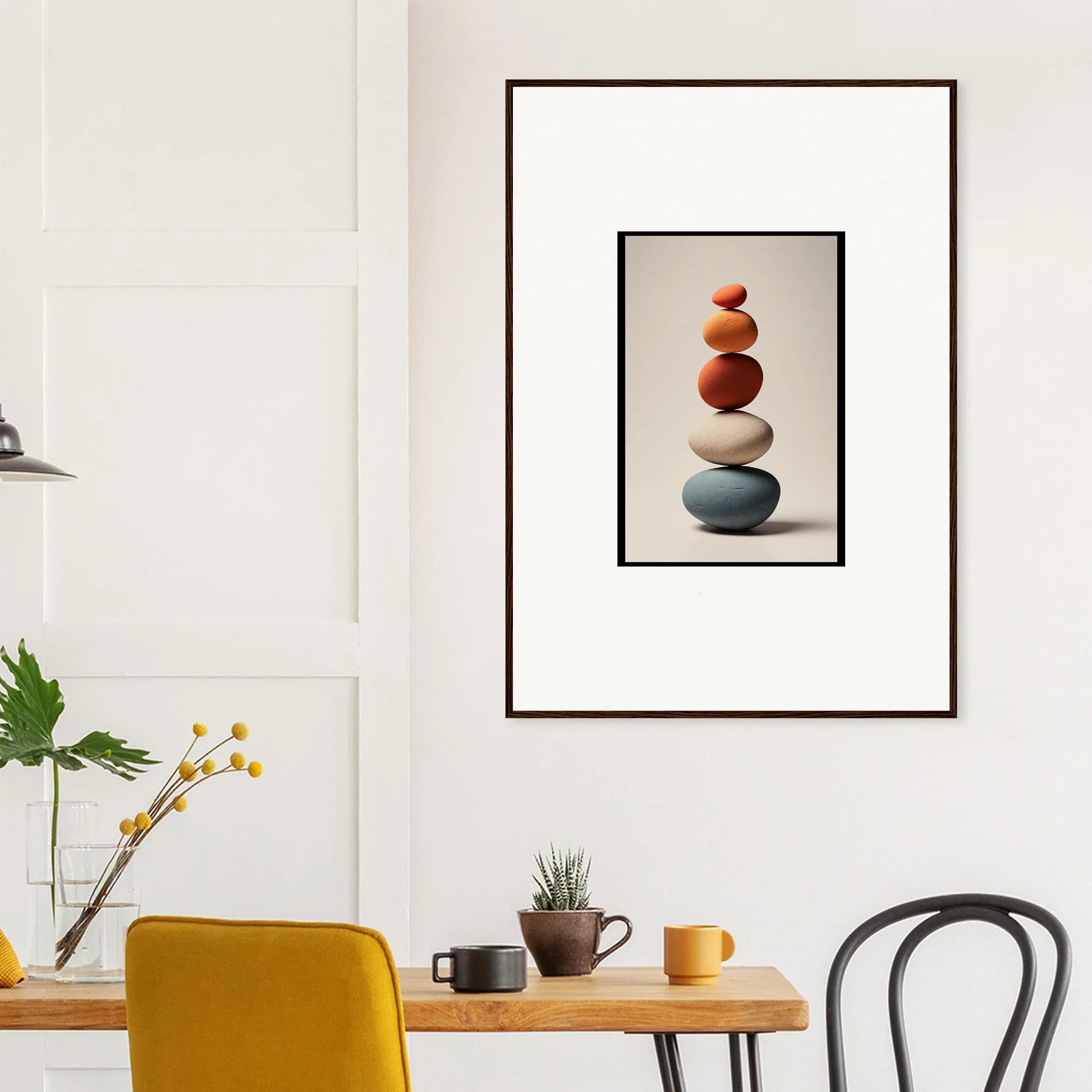 Framed wall art of balanced colorful stones for serene room decor and collage poetry