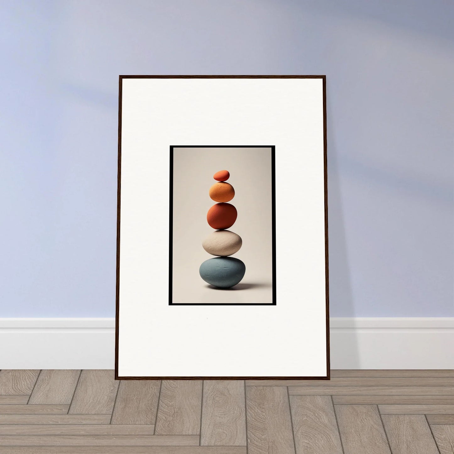 Framed wall art of balanced colored stones for beautiful room decor and collage poetry