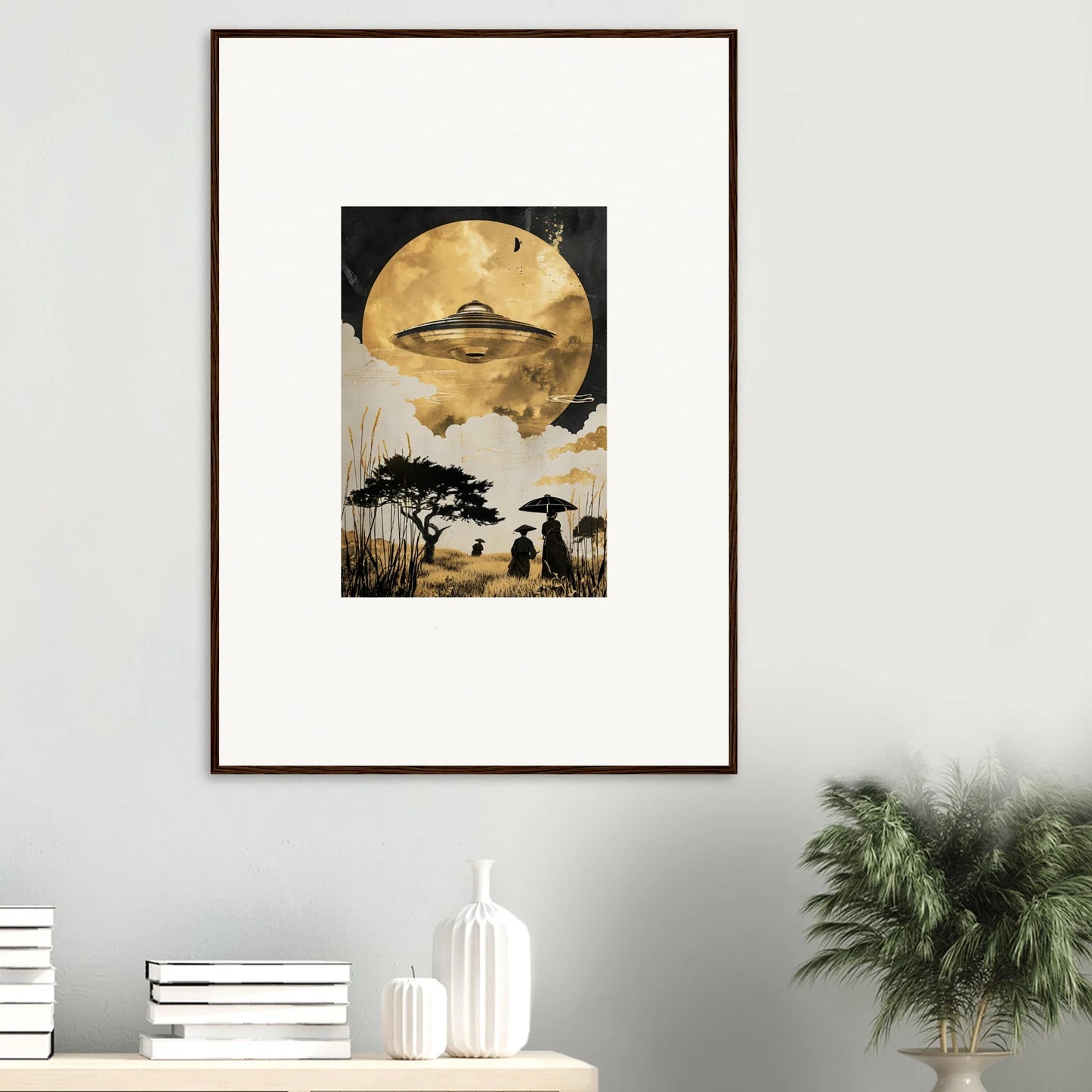 Framed wall art of a surreal landscape with UFO and figures under a giant moon, Golden Serenade