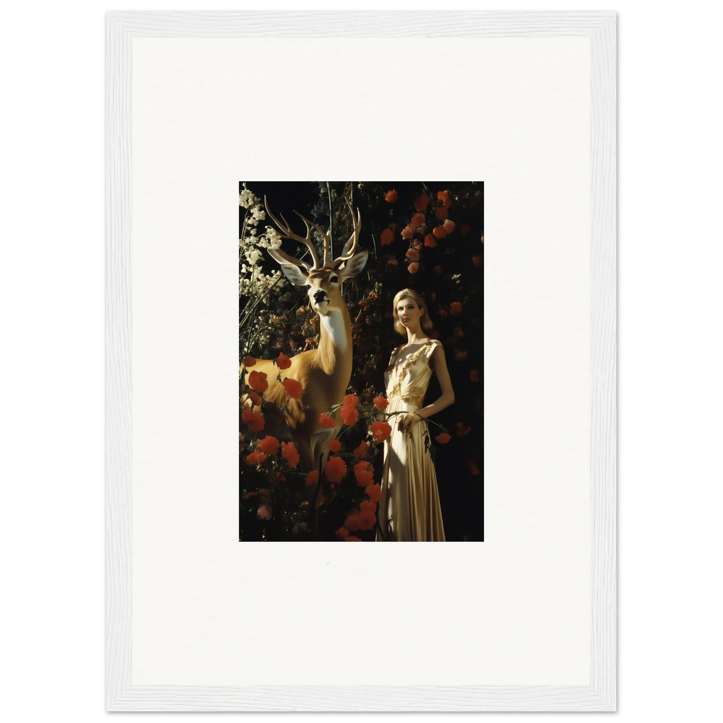 Framed artwork depicting a woman in a light-colored dress standing next to a deer in a forest setting.