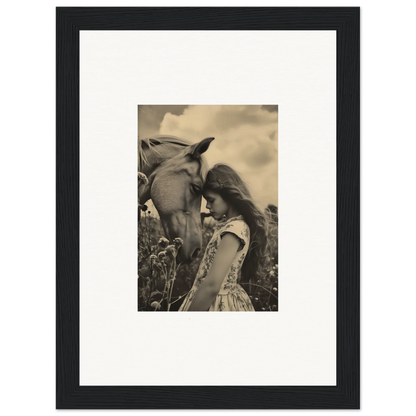 Framed black-and-white wall art of a girl touching a horse, perfect for room decor