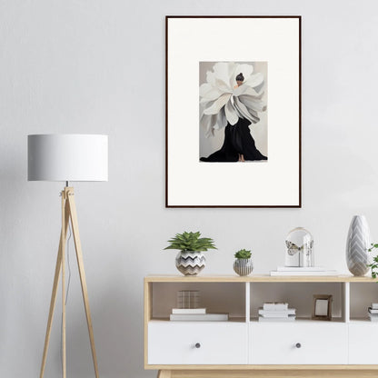 Framed black and white artwork of a figure with floral headpiece for unique room decor