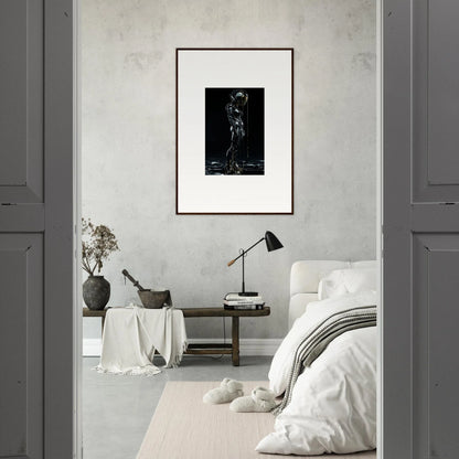 Framed black and white wall art of a standing figure for stylish room decor