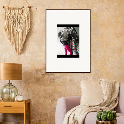 Framed black and white astronaut photo with pink accents for unique room decor