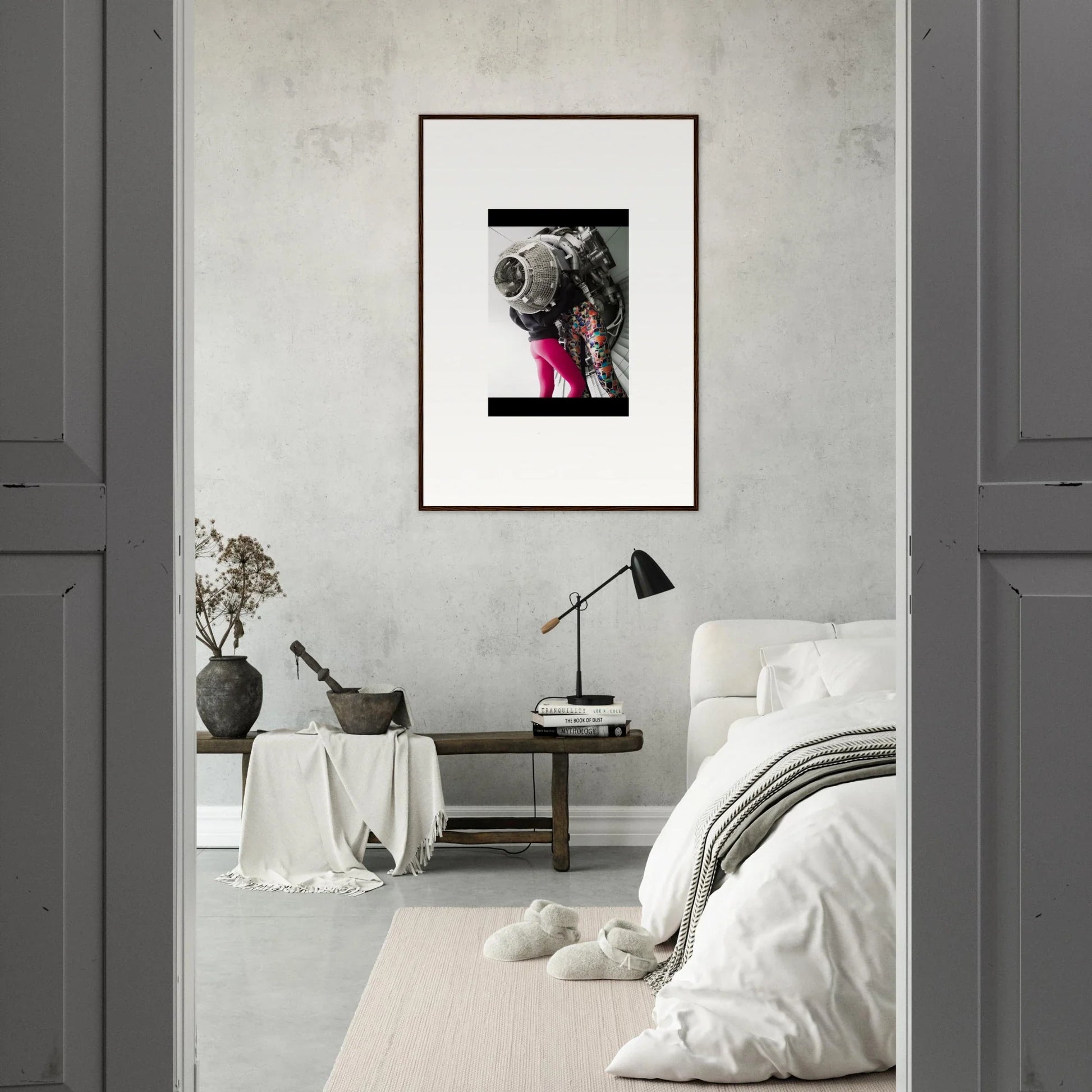 Framed black and white wall art of a dog in pink boots for unique room decor