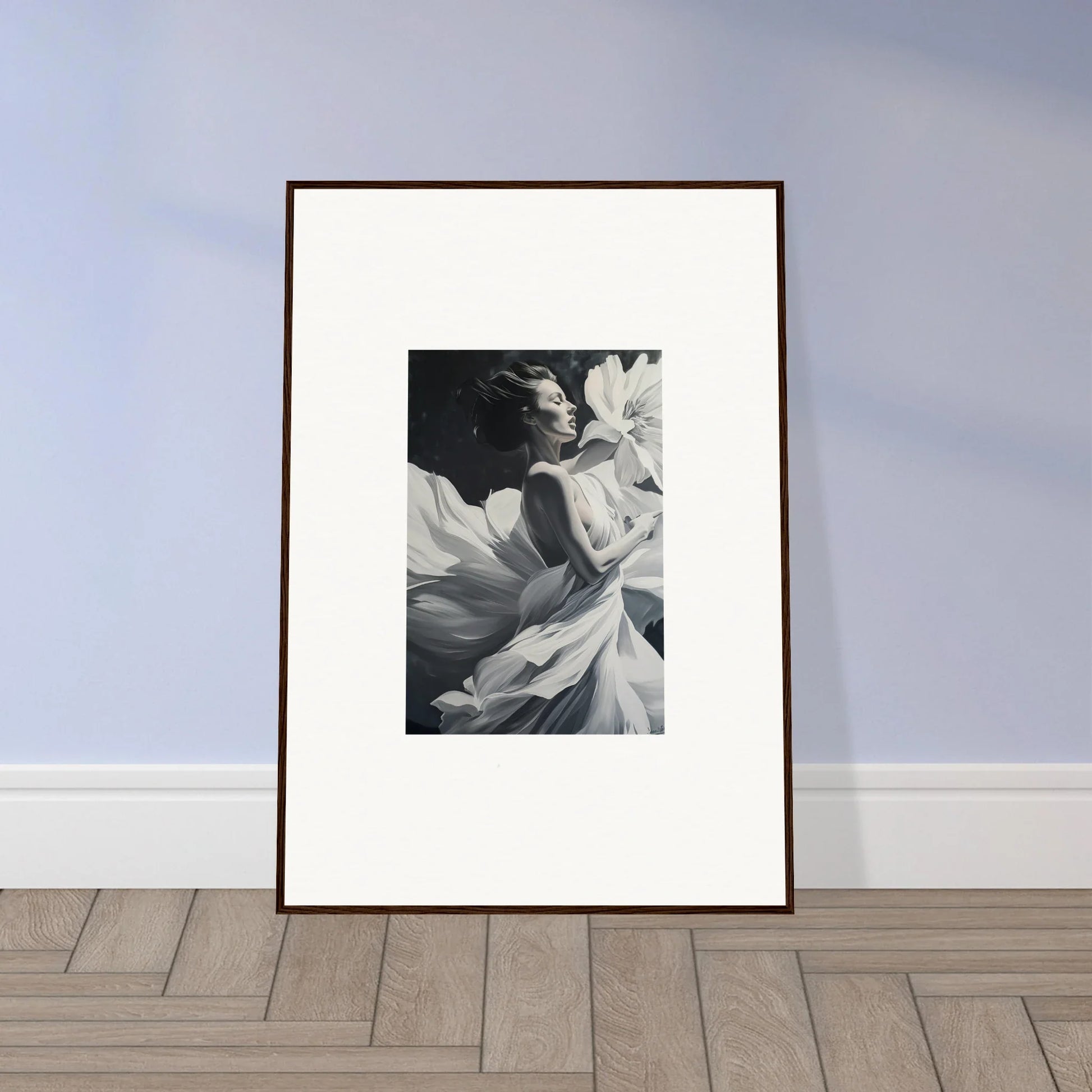 Framed black and white wall art of a person in fabric for dreamy room decor