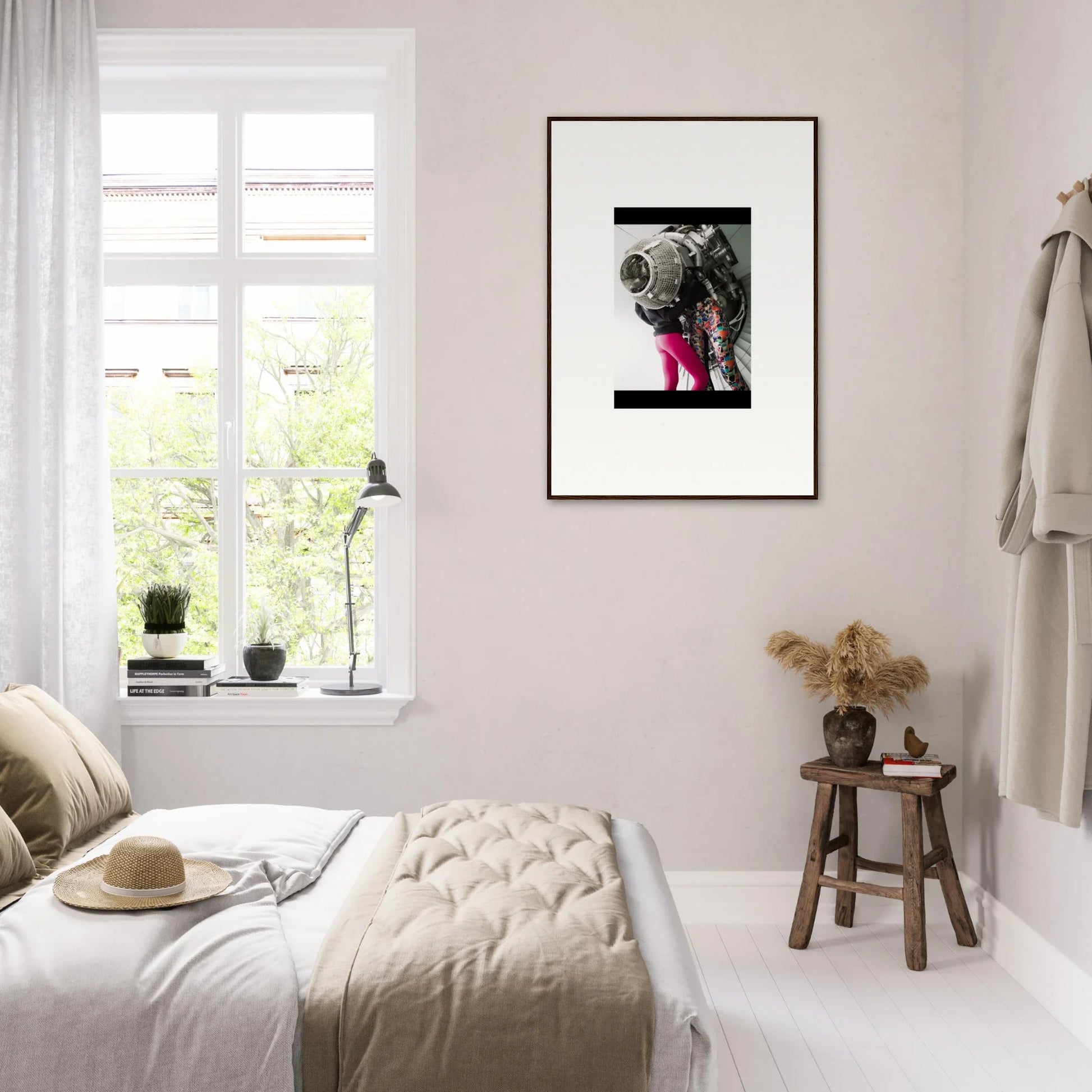 Framed black and white elephant photo with pink accents for unique room decor