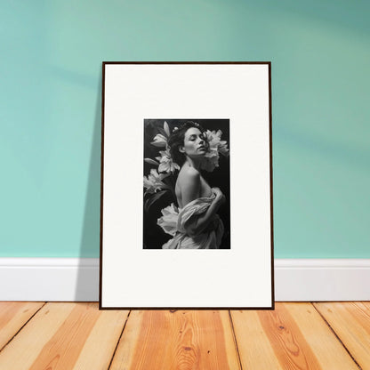 Framed black and white photograph of a person with flowers for elegant room decor