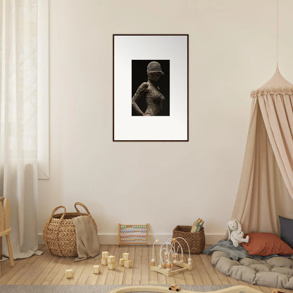 Framed black and white photograph of a figure wearing a helmet.