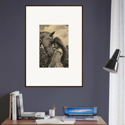 Framed black and white wall art of a person with long hair and a horse for room decor