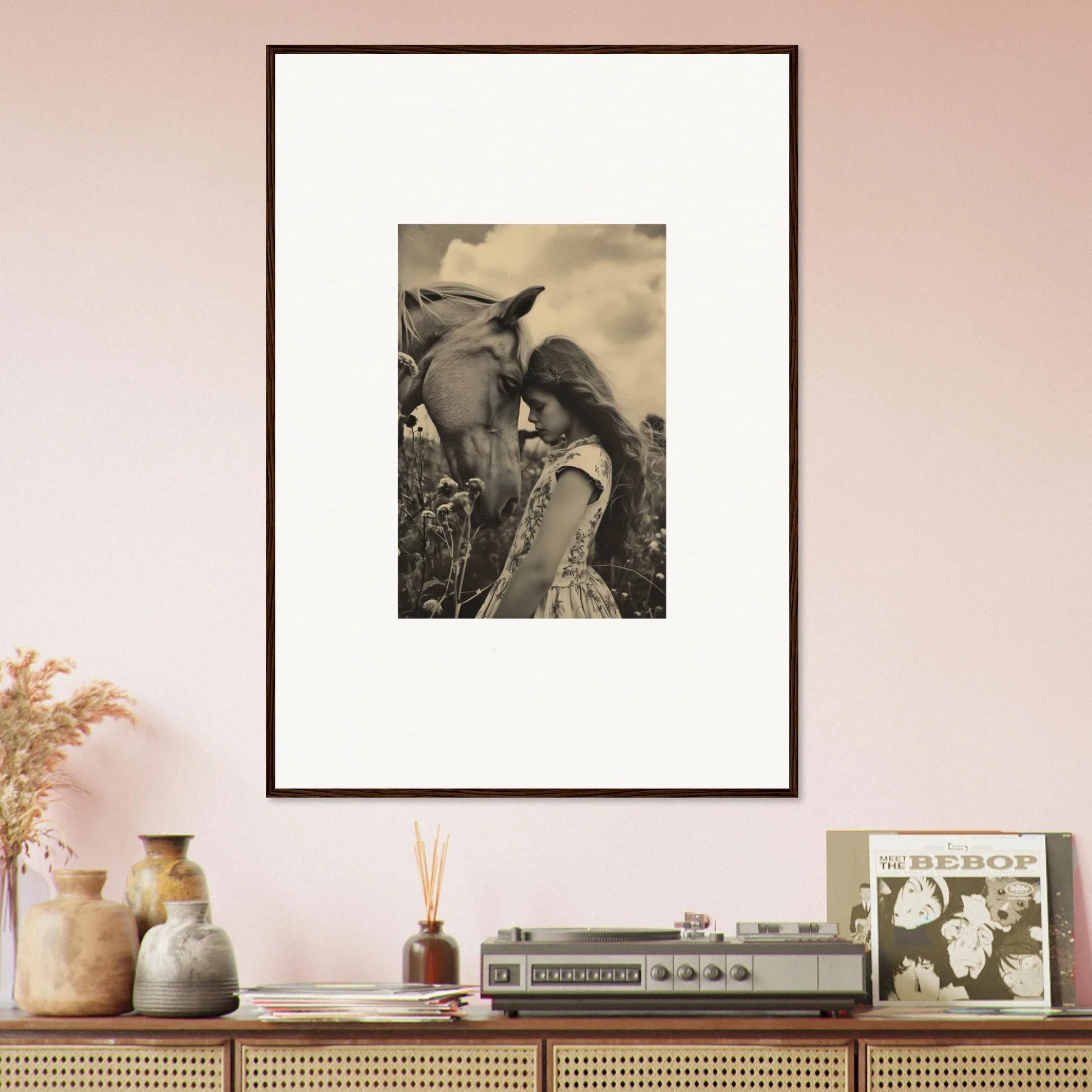 Framed black and white photograph of person embracing horse for serene room decor