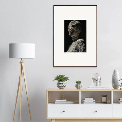 Framed black and white photograph of a textured, sculptural bust.