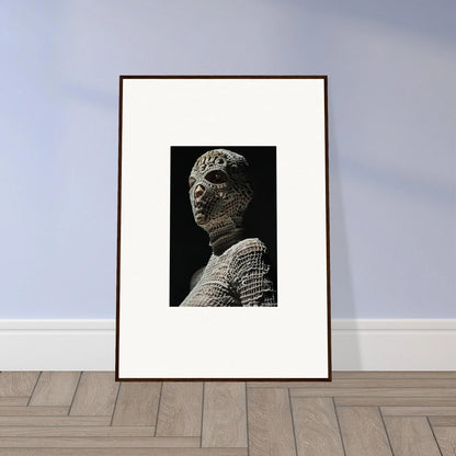 Framed black and white photograph of a stone or marble bust sculpture.