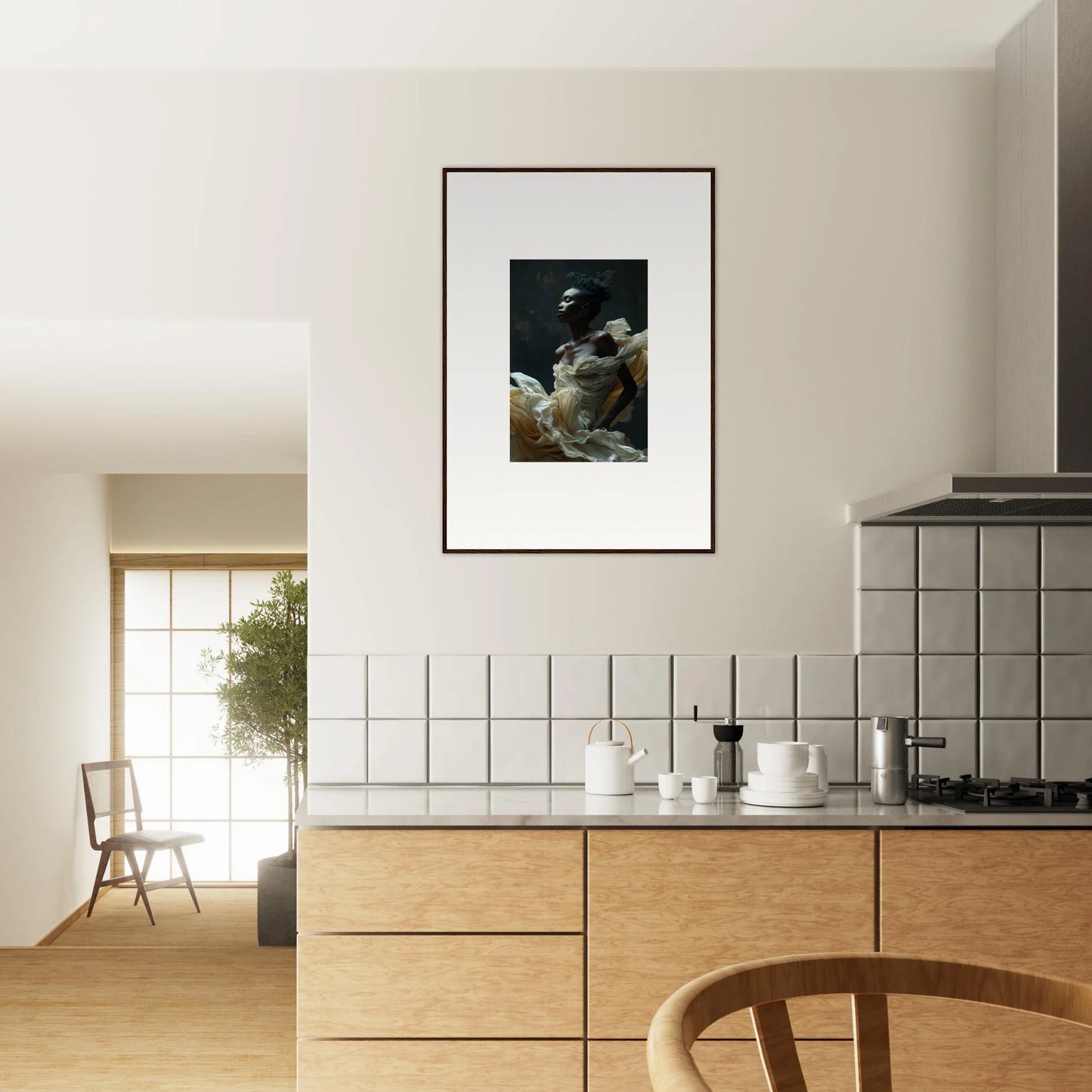 Framed black and white photograph hanging on a wall above a kitchen counter.