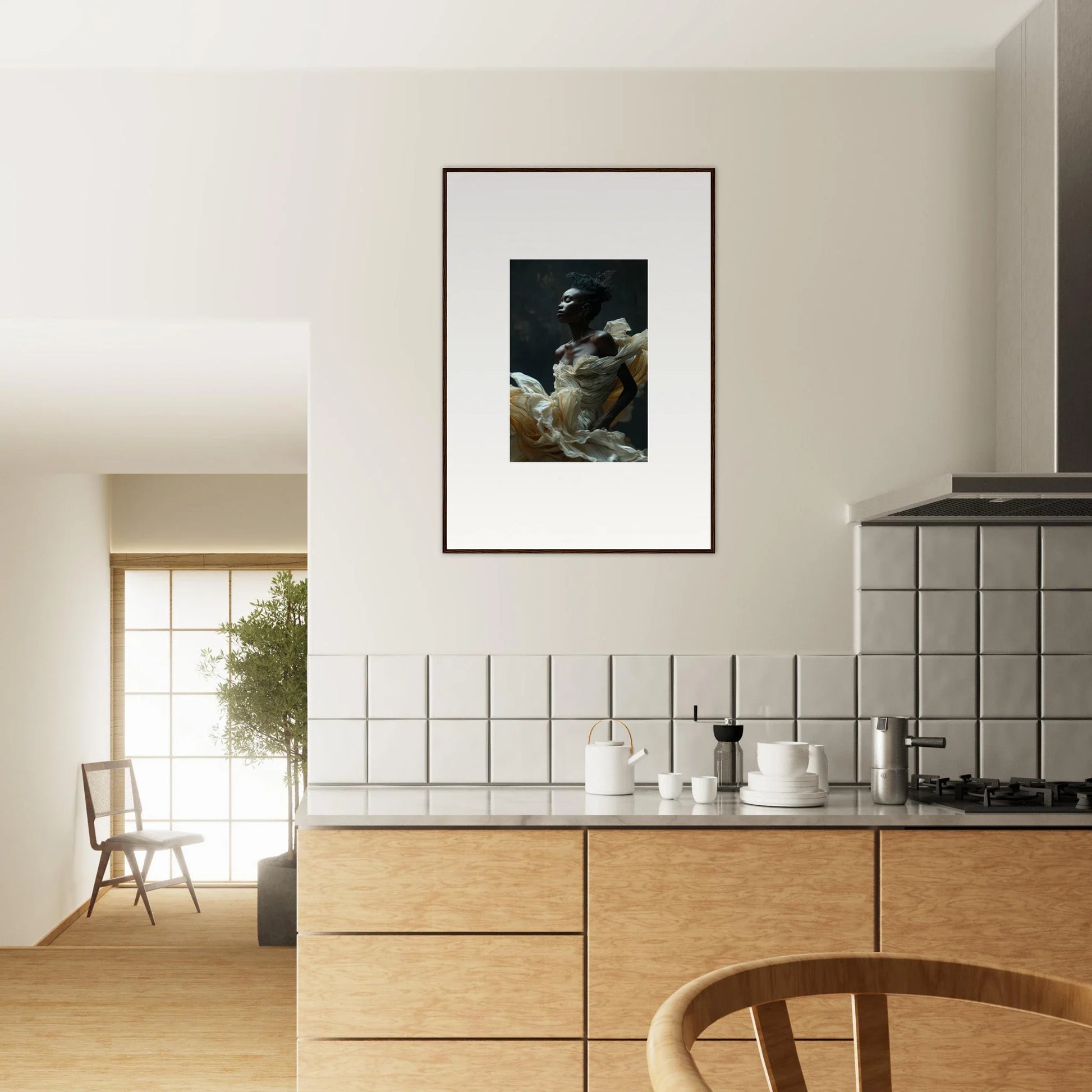 Framed black and white photograph hanging on a wall above a kitchen counter.