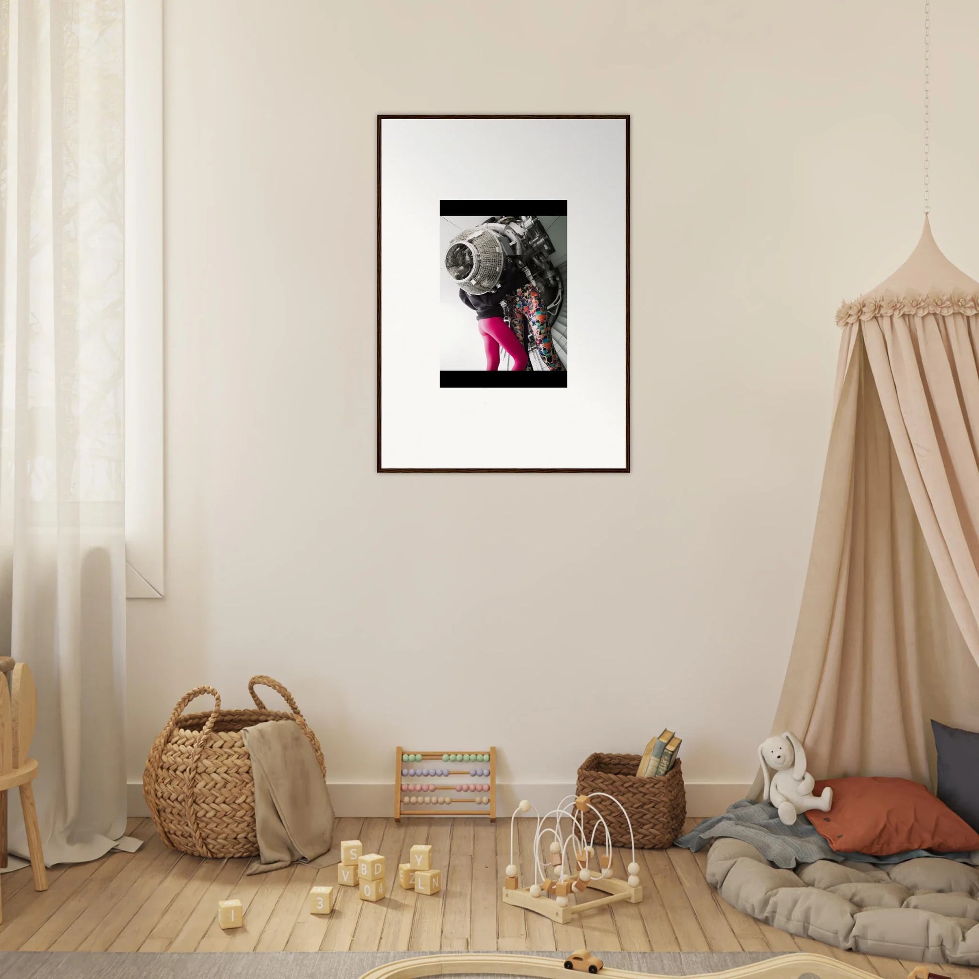 Framed black and white astronaut photo with pink legs for unique room decor magneto embrace