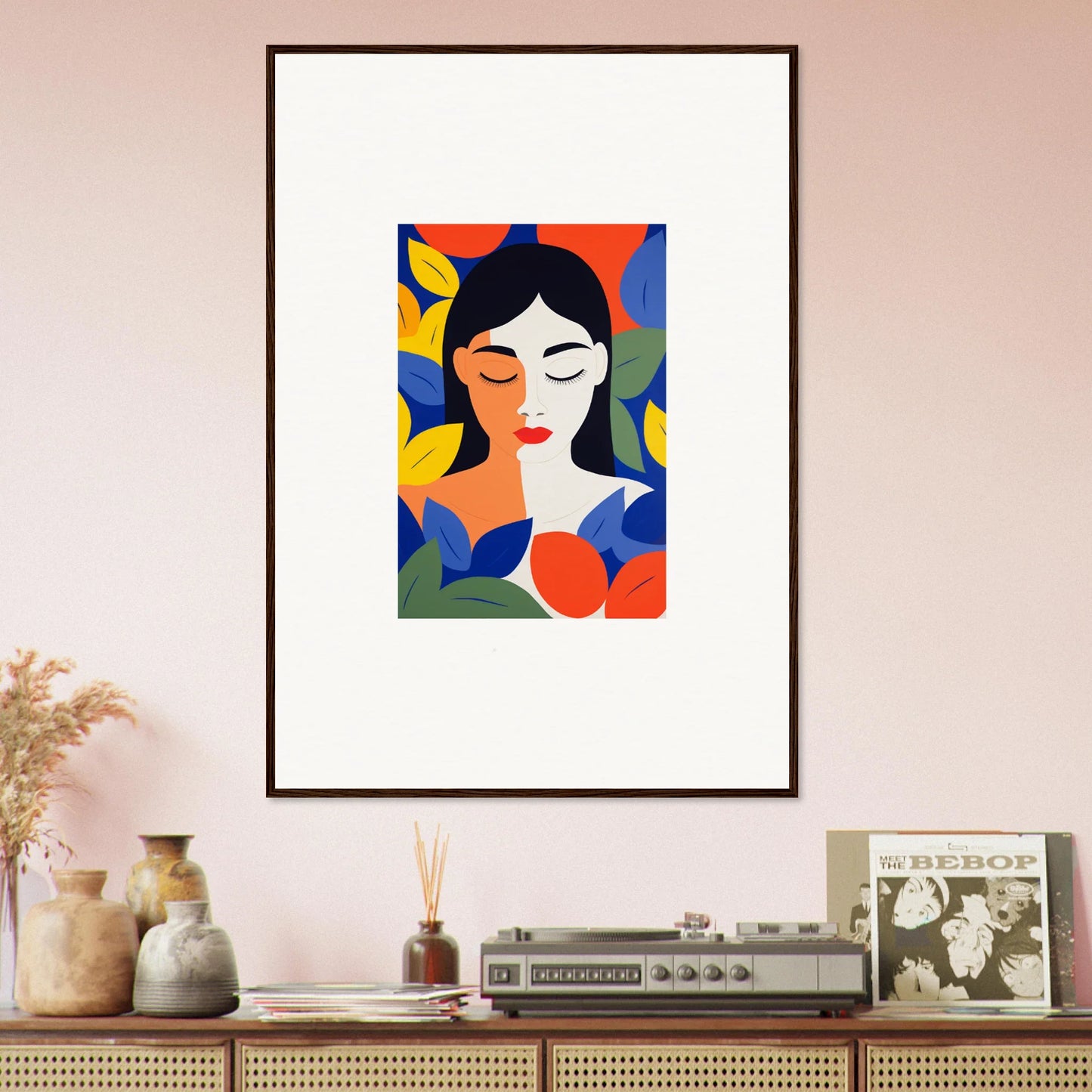 Framed wall art of a colorful abstract portrait of a woman among floral elements