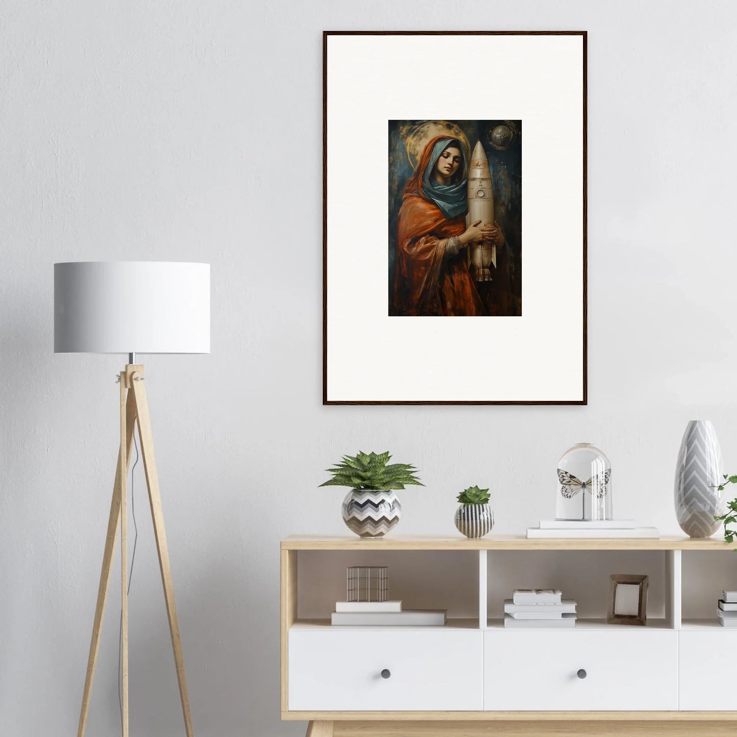 Framed wall art of a figure in red robes holding a scroll for Quantum Atelier room decor