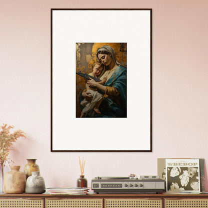 Framed wall art of a woman holding a baby, enhancing room decor with serenity spirit