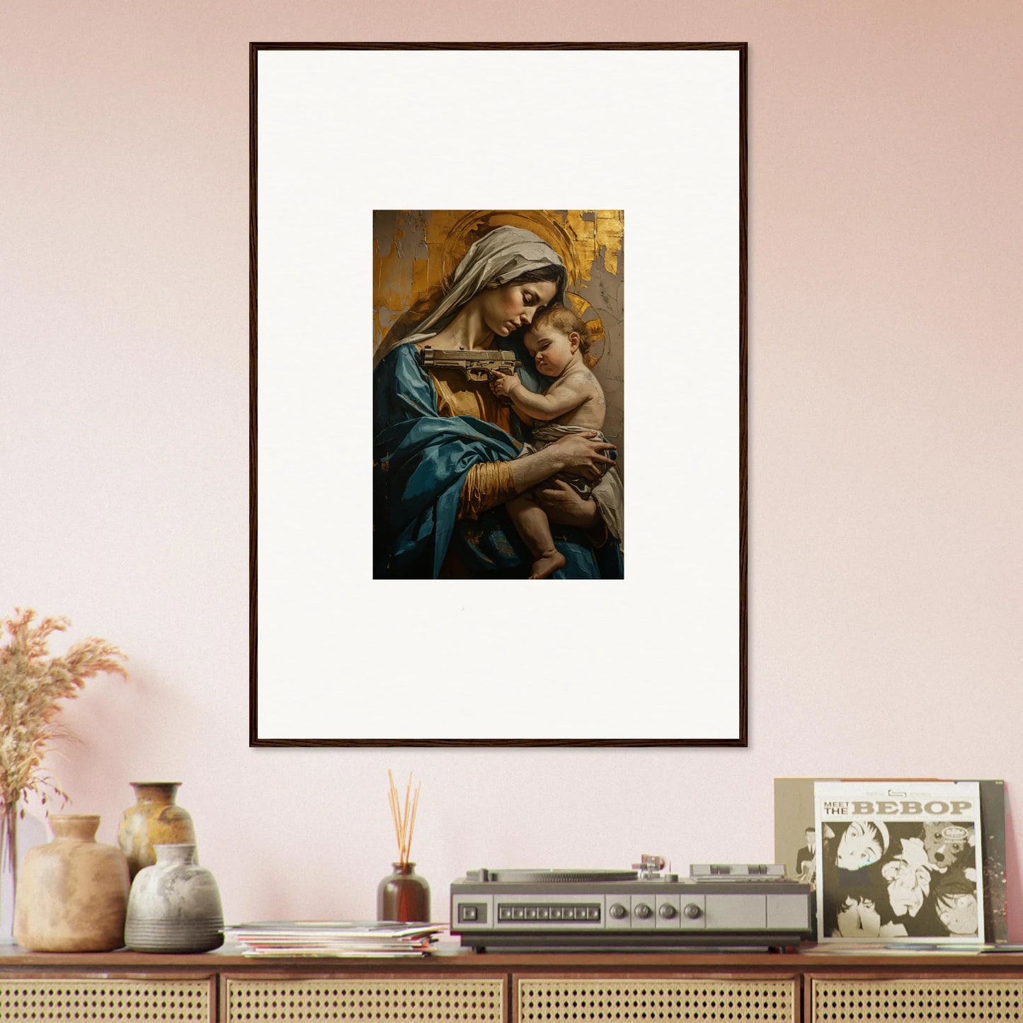 Framed wall art of a woman and child, enhancing Saints Harmony room decor