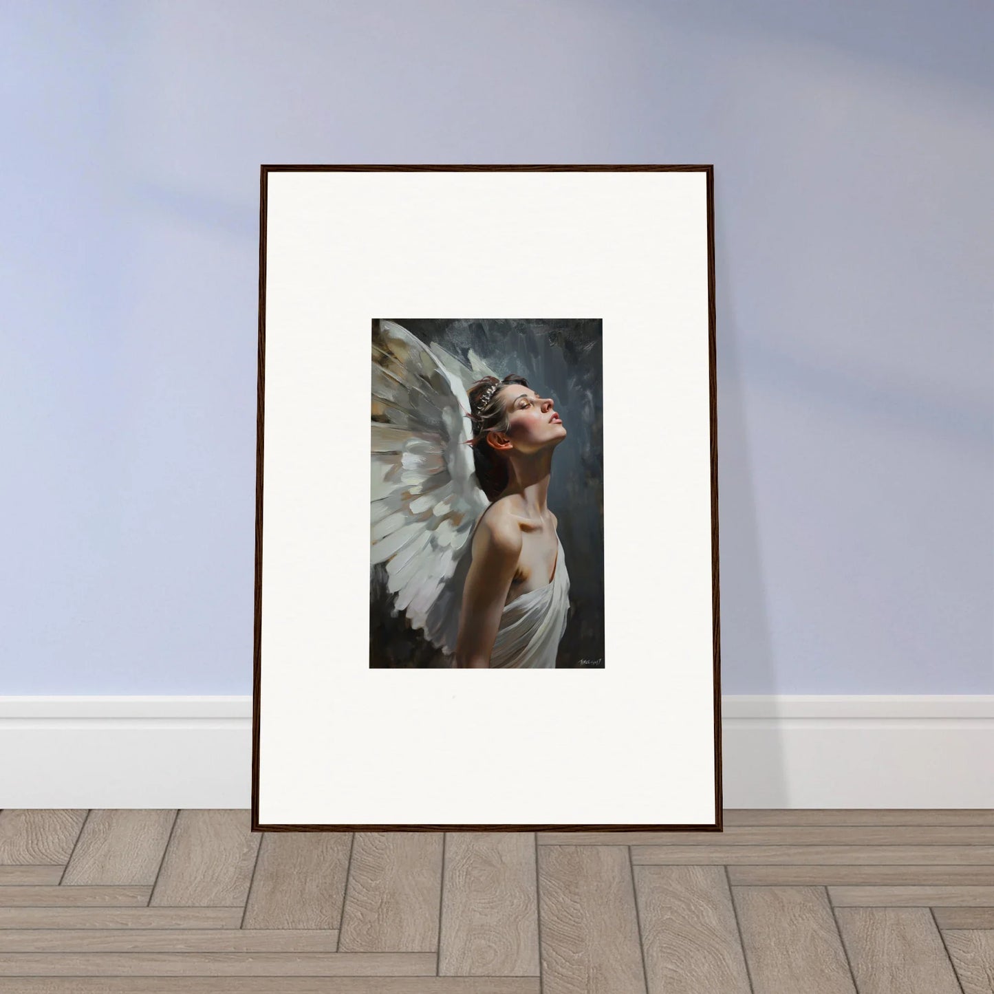 Framed wall art of a figure with white wings in a light orchard setting