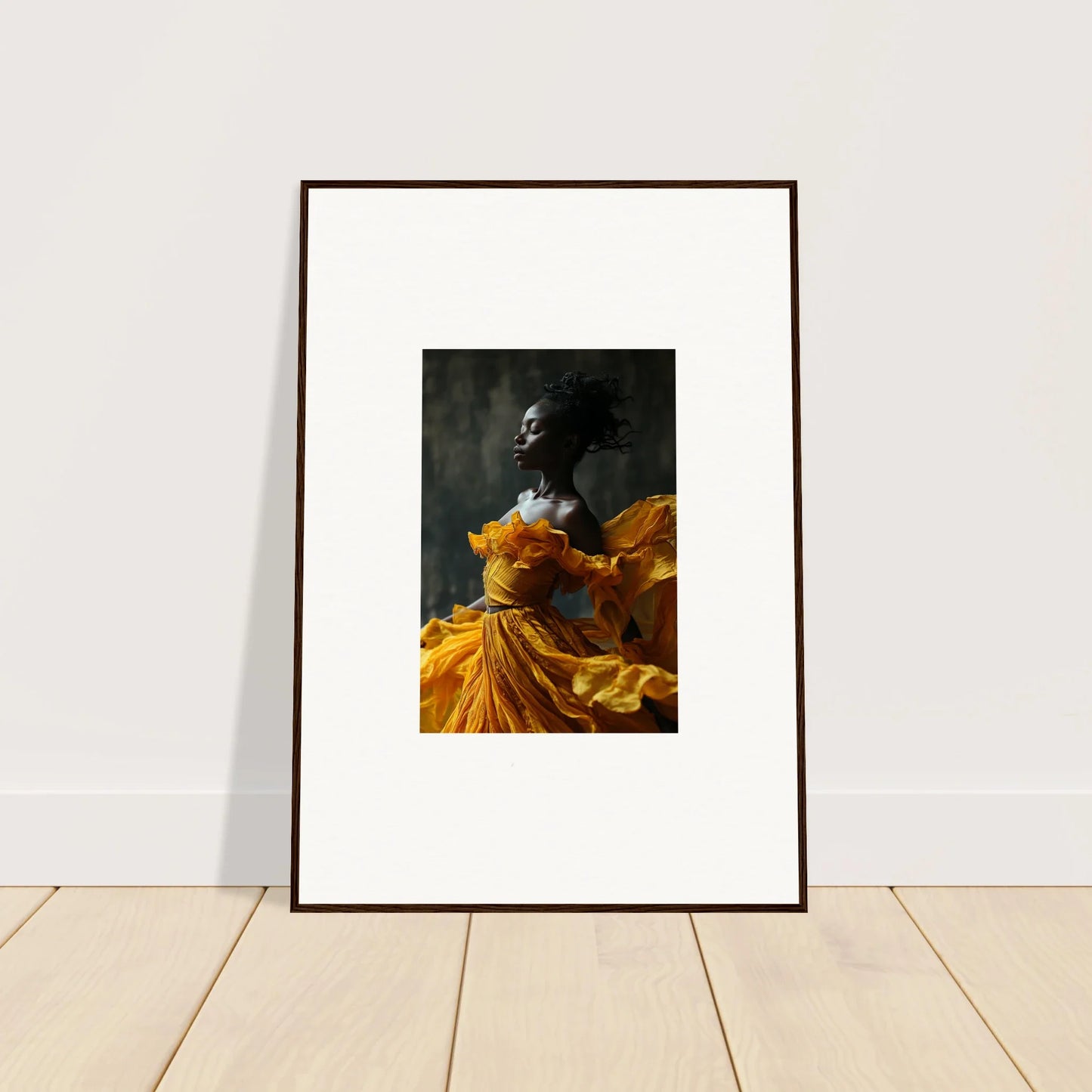 Framed wall art of a person in a yellow dress, perfect for sunlit whispers room decor