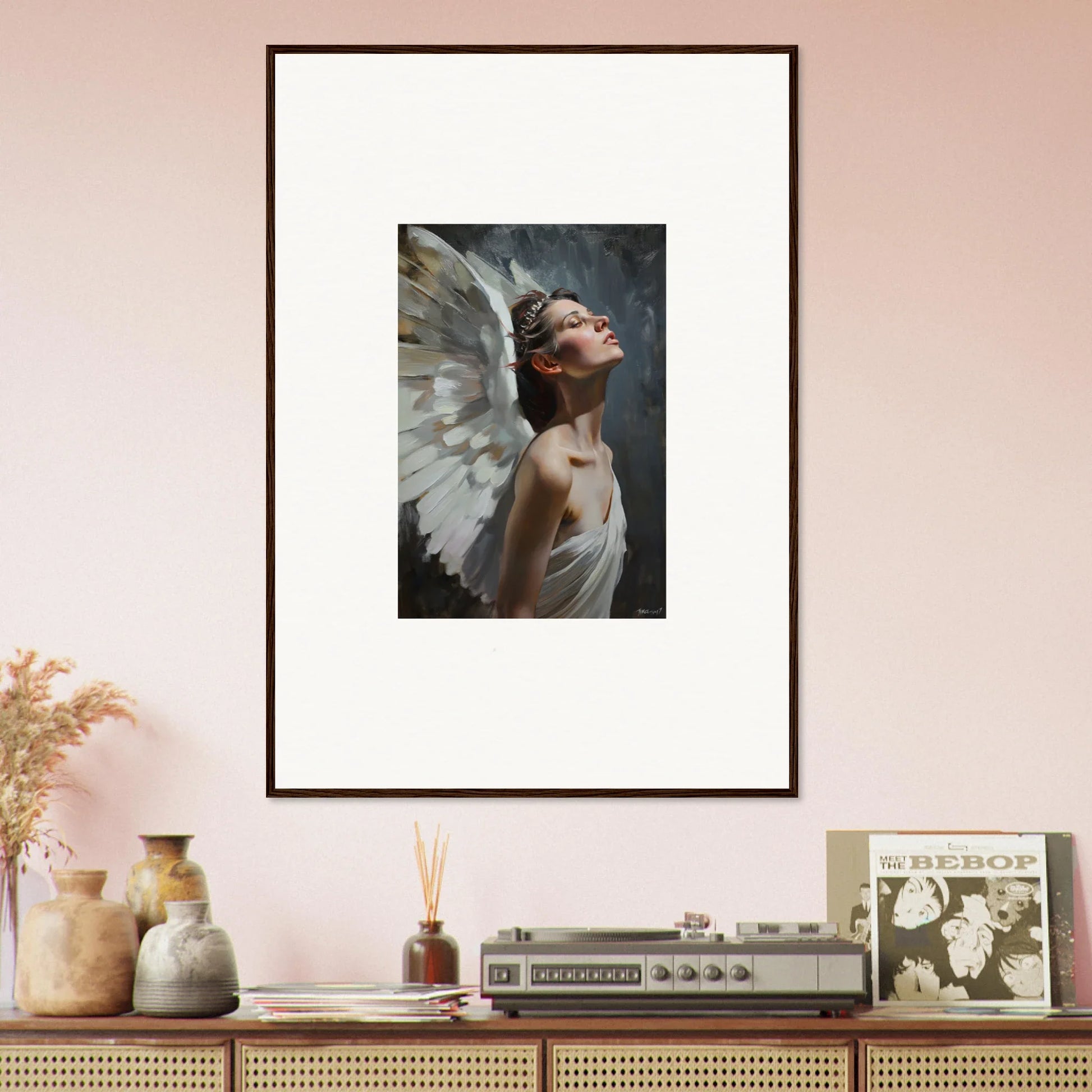 Framed wall art of a figure with white wings for ethereal room decor in Light Orchard