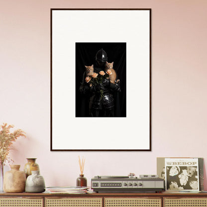 Framed wall art of a person in dark clothing with two orange cats for floral epiphany room decor