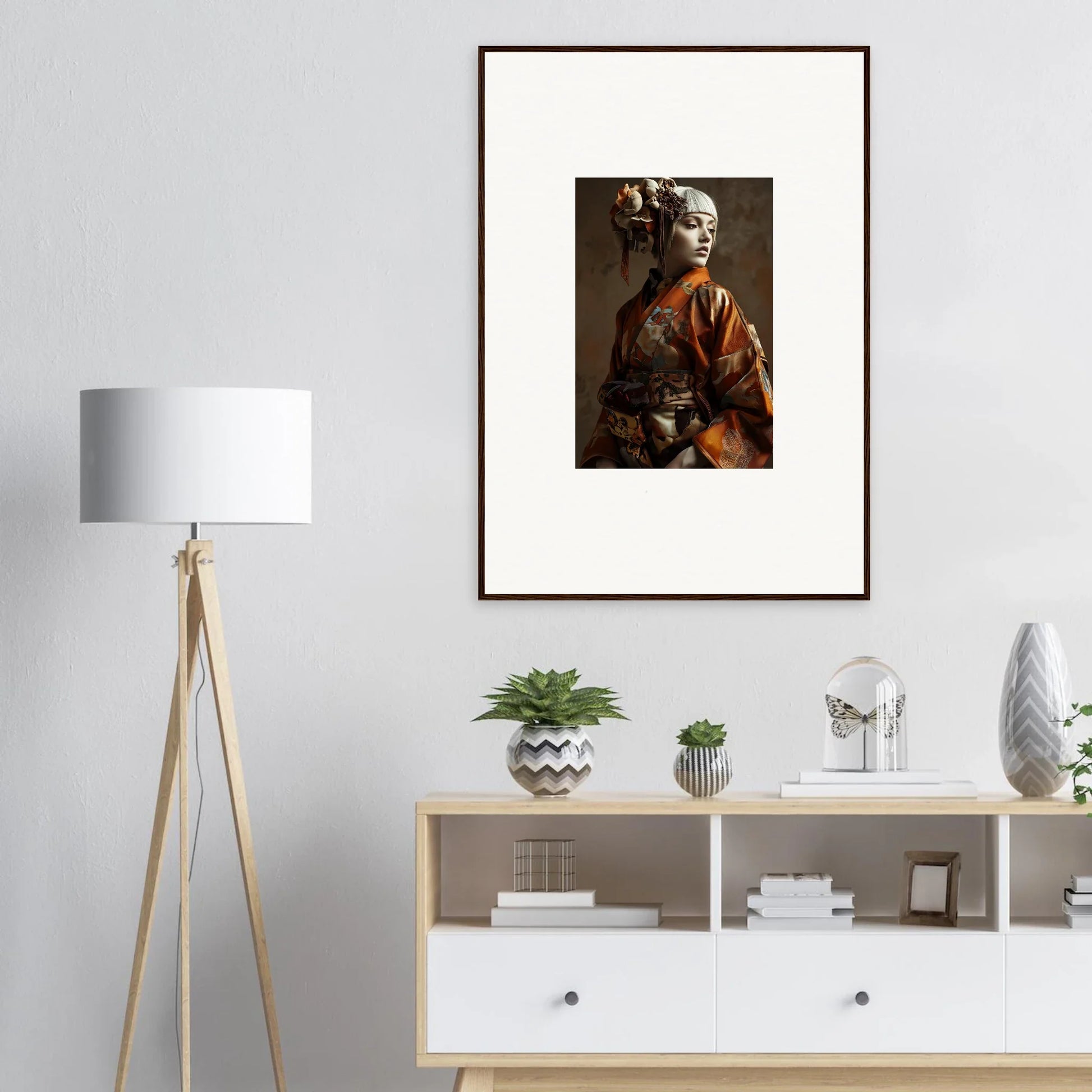 Framed wall art of a person in traditional Asian attire with shadows whispering decor